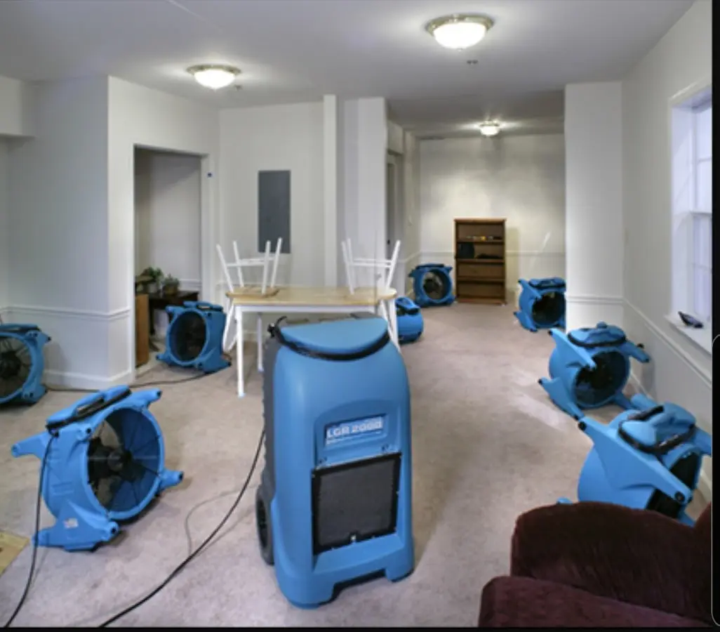 Air movers and dehumidifier setup for Water Damage Restoration in Lake Grove