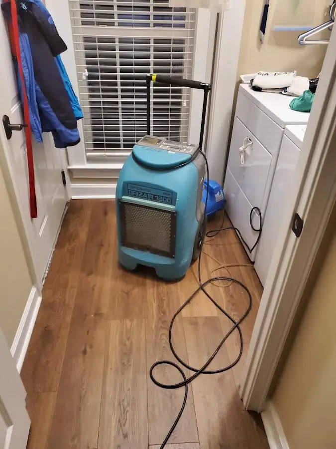 Commercial dehumidifier deployed for Flood Damage Cleanup in Lake Grove